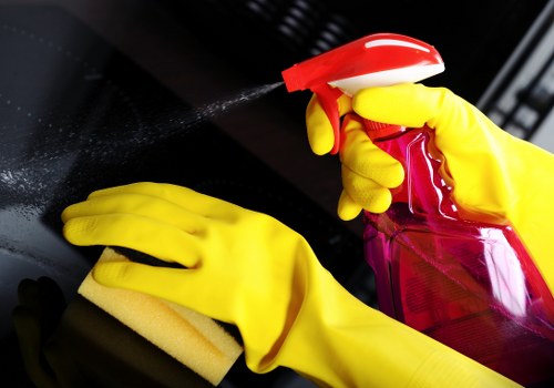 Staff following health and safety practices during a professional cleaning service